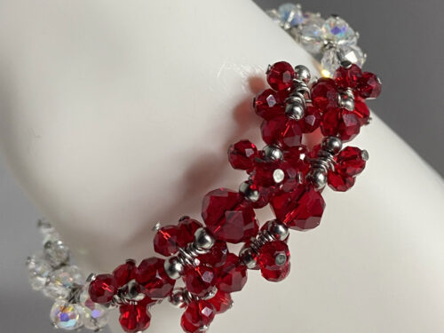 ND Memory wire bracelet with red/clear faceted glass beads