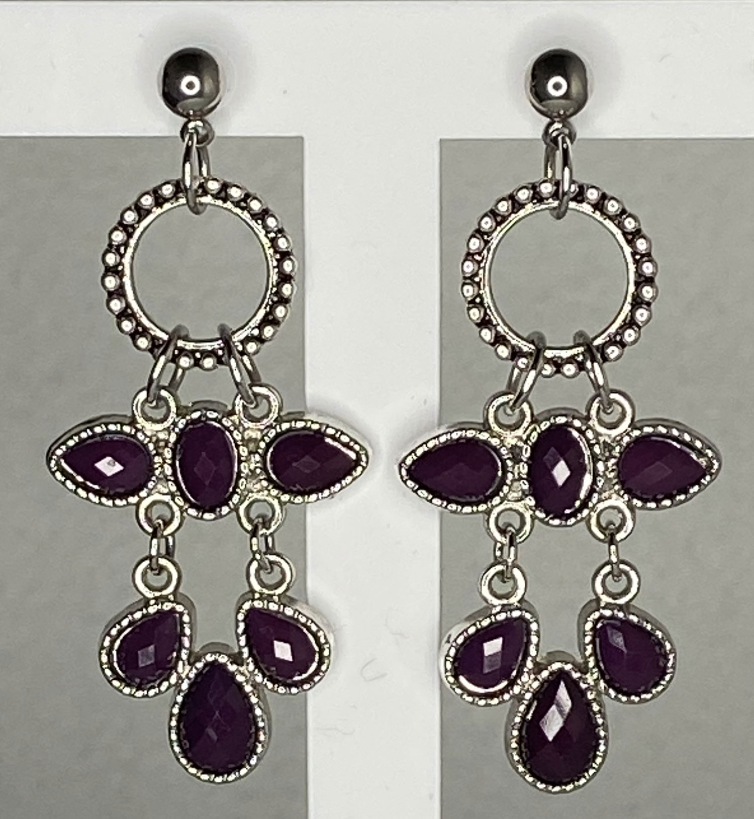ND Rhodium plated faux faceted purple cabochon earrings