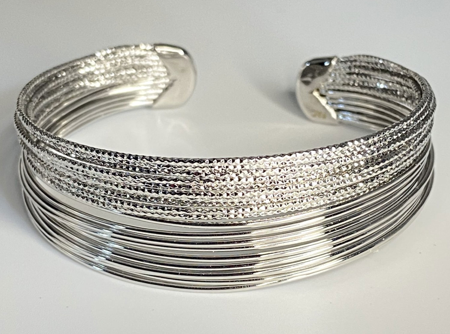 Pre-loved FAC rhodium plated cuff bracelet