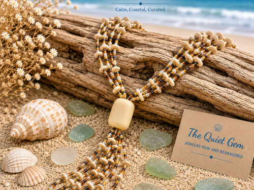 Vintage multi-strand ethnic-inspired beaded necklace with natural-toned beads, large wood focal bead and long cascading tassel.