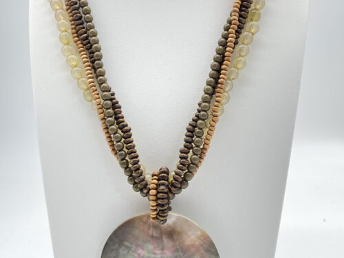 Pre-owned multi-strand wood and glass bead necklace with round iridescent mother-of-pearl pendant