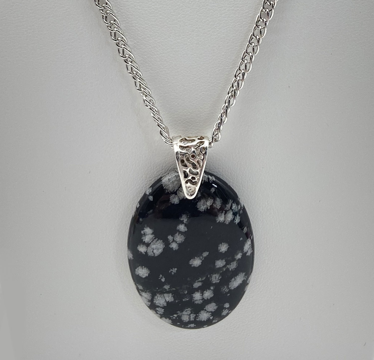 Pre-owned Snowflake Obsidian pendant necklace with polished black and white patterned stone