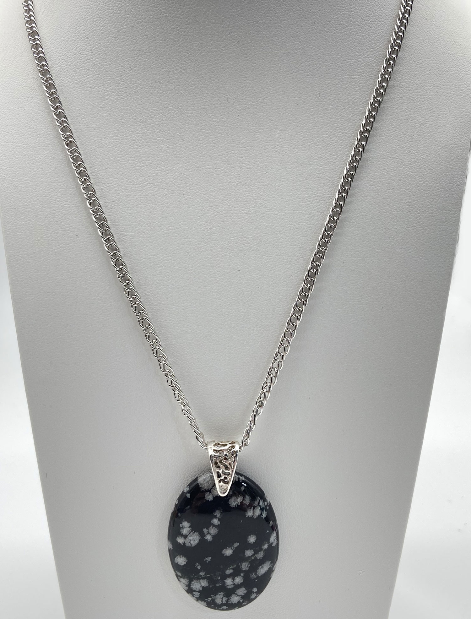 Pre-owned Snowflake Obsidian pendant necklace with polished black and white patterned stone