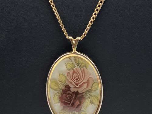 Vintage Avon Lucite rose floral pendant necklace on an 18-inch gold-tone chain