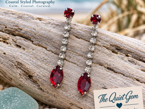Pre-owned silver-tone earrings with clear rhinestones and red faceted drops