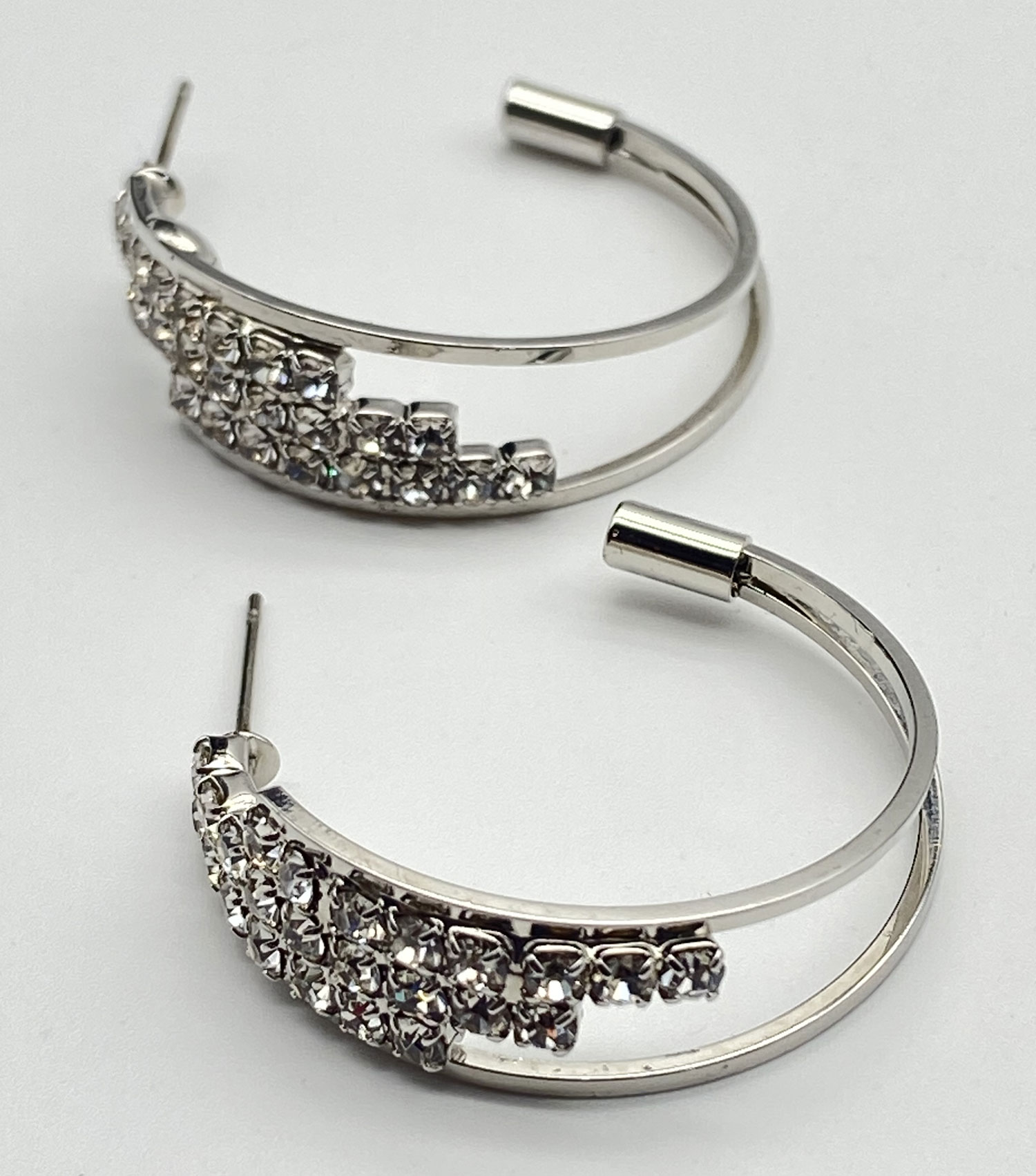 Pre-owned rhodium-plated silver-tone rhinestone offset double hoop post earrings