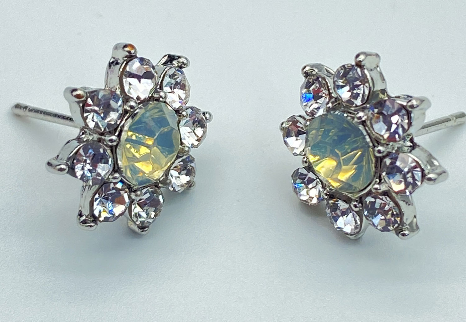 Pre-owned yellow AB rhinestone post earrings surrounded by clear rhinestones