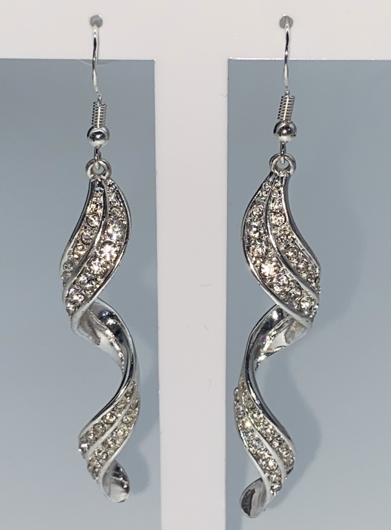 Pre-owned rhodium-plated silver-tone rhinestone spiral drop earrings with new 925 sterling silver ear wires