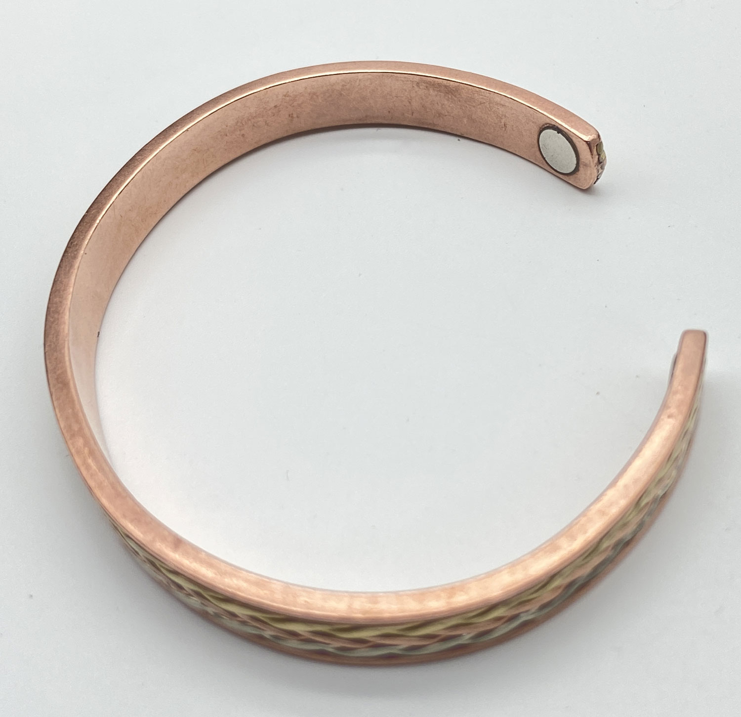 Pre-owned open cuff bracelet featuring an intertwined braided-style design in copper, brass, and silver tones.
